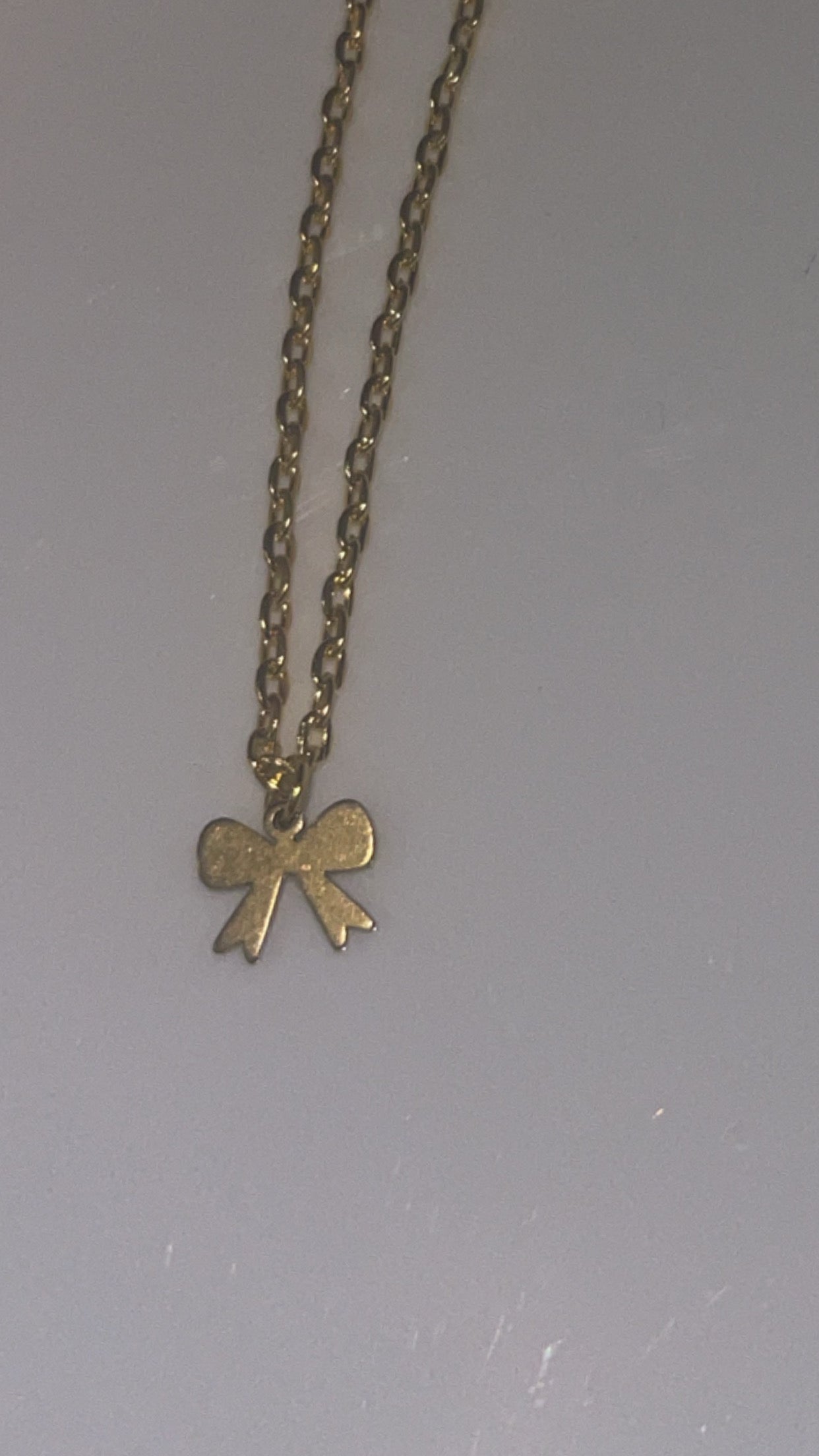 Elegant Gold Bow Pendant Necklace