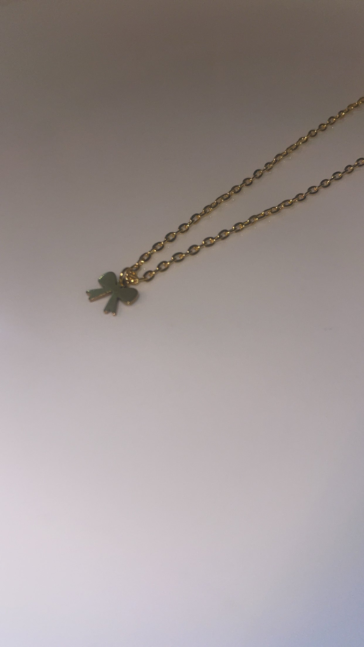 Elegant Gold Bow Pendant Necklace