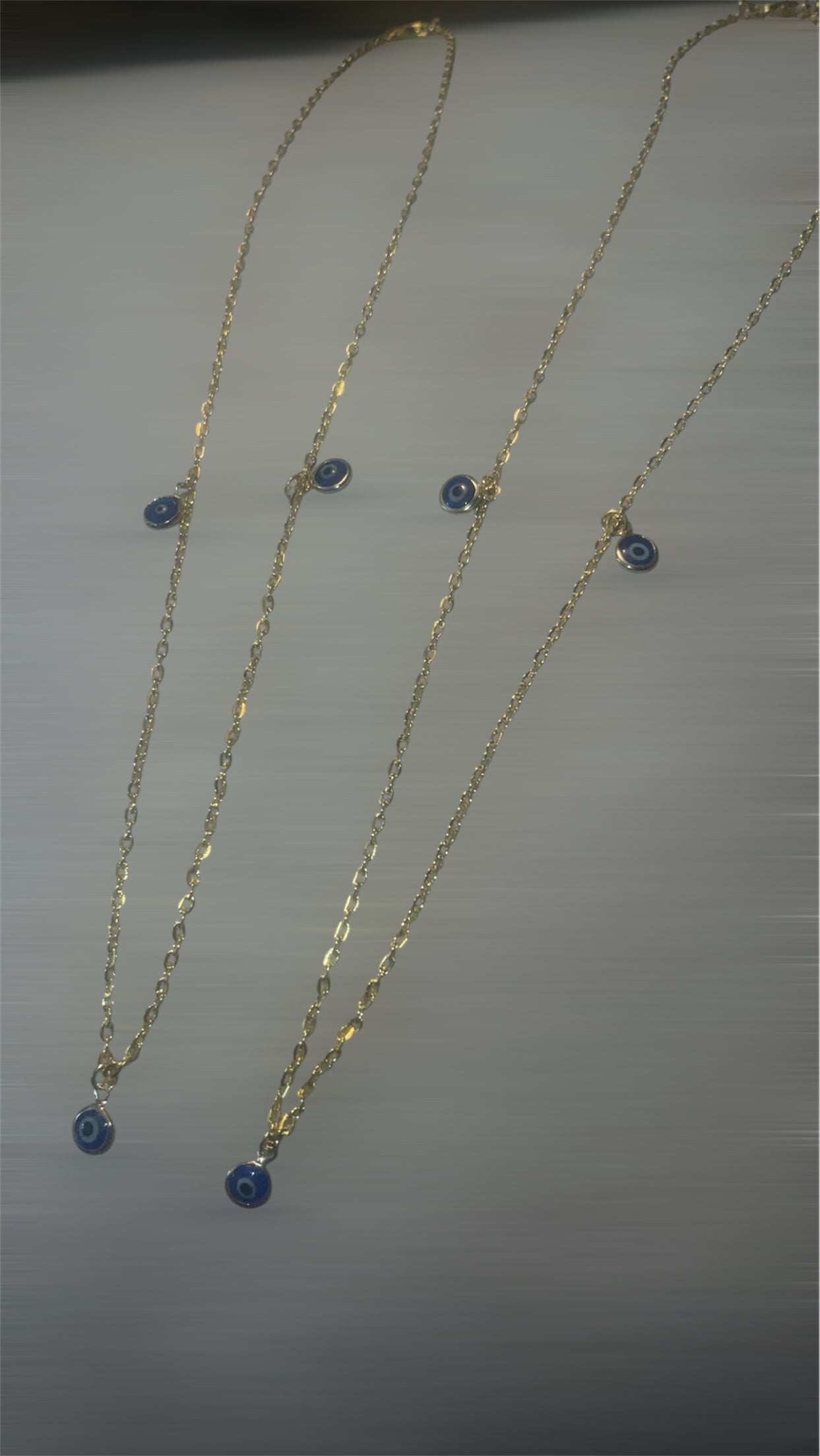 Gold Necklace with Blue Circular Pendant