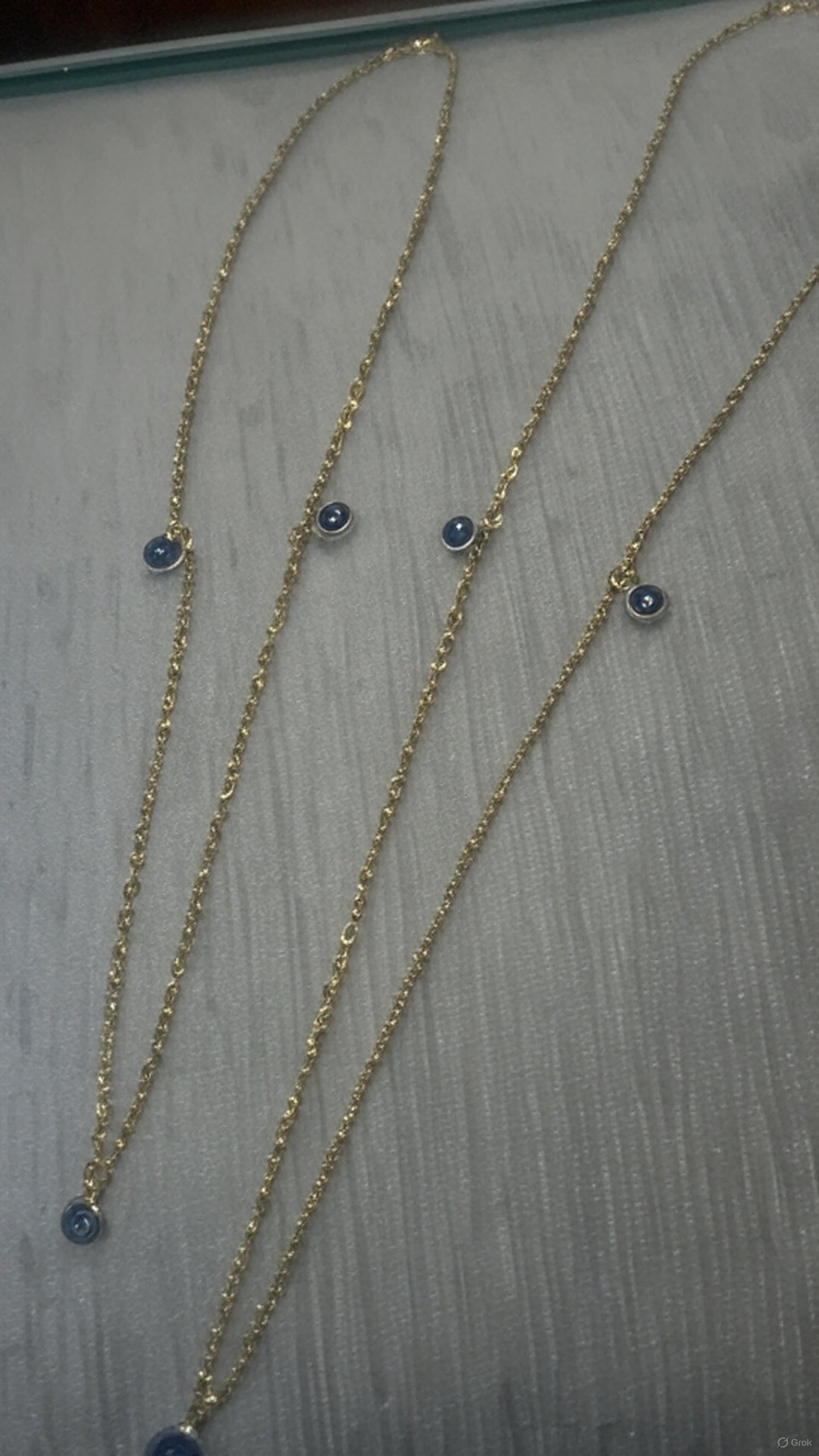 Gold Necklace with Blue Circular Pendant